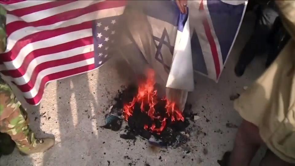 Risultato immagini per iran burnt flags usa israel